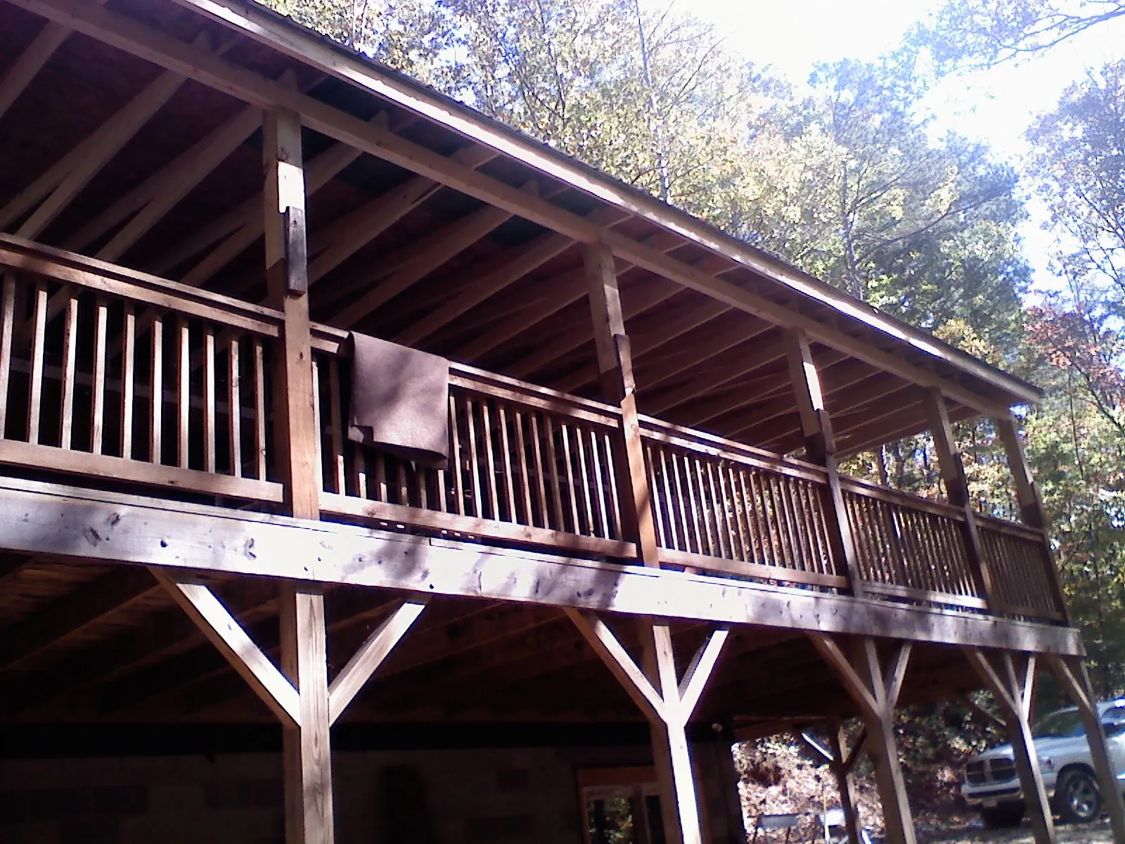 Timber framing under a new elevated porch and deck — Roof Leak Repair in Frankenmuth by Roofing Brothers
